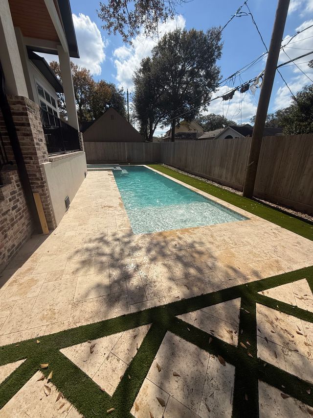After: the same view from the patio, with clear water and a much cleaner deck